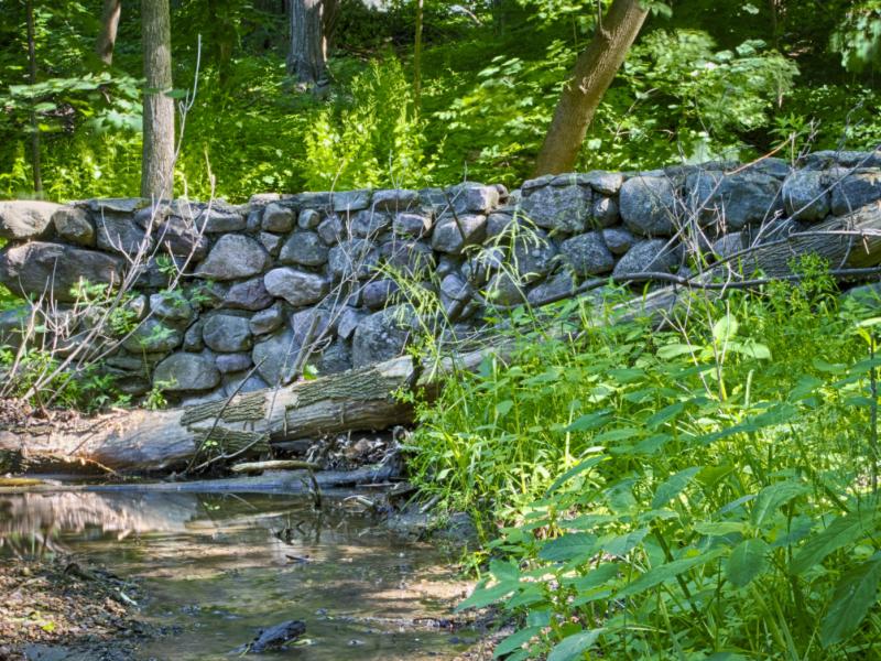 Old stone bridge crossing Engelsby Brook