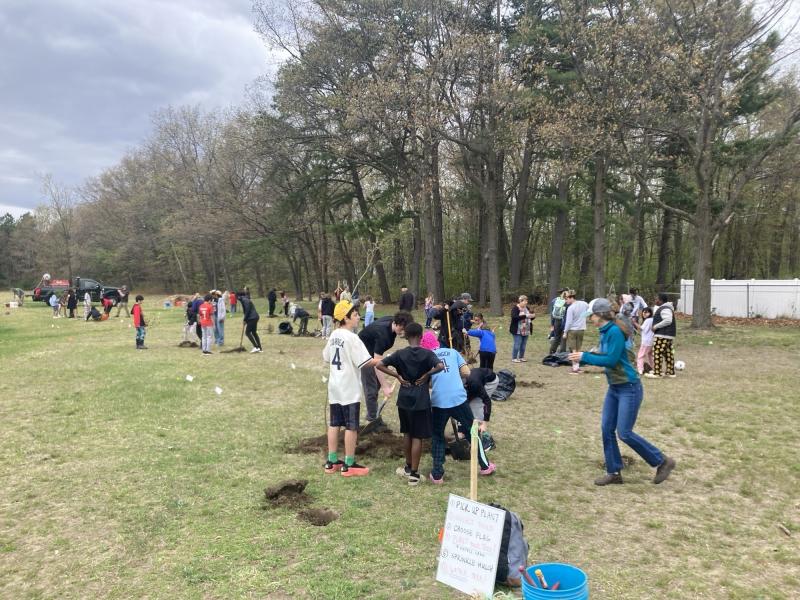 pocket forest tree planting day with high school student helpers