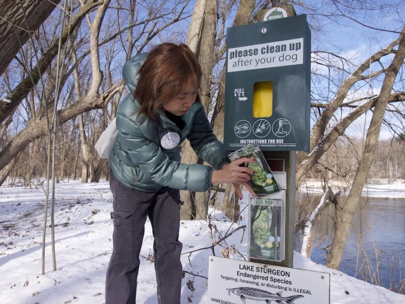 Steward replacing trail maps