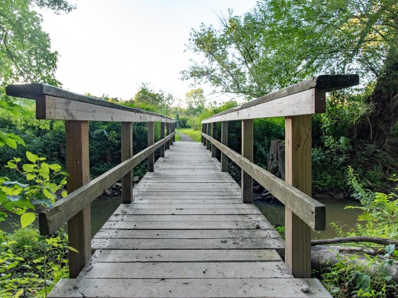 Bridge crossing on the cycle the city path at the Ethan Allen Homestead