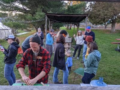 Stewards gather for a pizza party at Rock Point